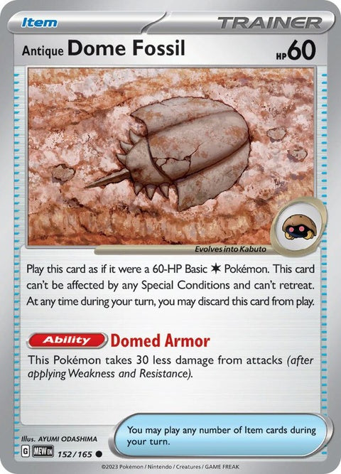 Pokémon Antique Dome Fossil for Pokémon Singles collection, featuring detailed fossil design on a metallic surface.