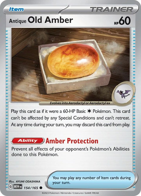 Pokémon Antique Old Amber 151 singles card featuring a vintage Pokémon illustration with detailed artwork and branding.