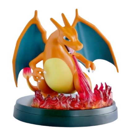 Dragon-like creature figurine with orange body and blue wings on a white background