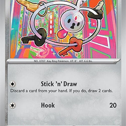 Pokémon Surging Sparks Klefki single card featuring a detailed illustration of the fairy and steel-type Pokémon.